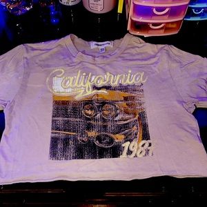 I am selling a crop top in a khaki color and the brand is Obsessive Love